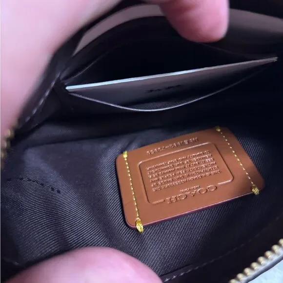 Coach Signature Dreamer Brown and White Women's Wristlet with Cherry Charm - Picture 5 of 9